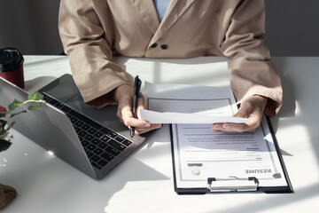 Business woman employer holding resume hiring recruit looking cv resume to hire candidates,...