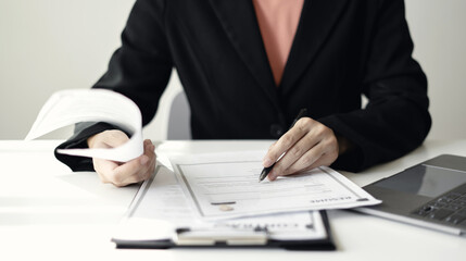 Business woman employer holding resume hiring recruit looking cv resume to hire candidates,...