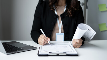 Business woman employer holding resume hiring recruit looking cv resume to hire candidates,...