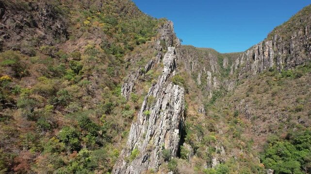 canyons and valley Guardian waterfall,  Vao do Moleque community in Chapada dos Veadeiros,  blue water, sunny day, incredible landscape