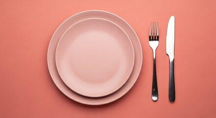 Salmon Color Table Setting: Plates, Fork, Knife on Colored Surface, Stylish Dining Arrangement, Modern Flat Lay Tableware Collection, Creative Minimalist Presentation