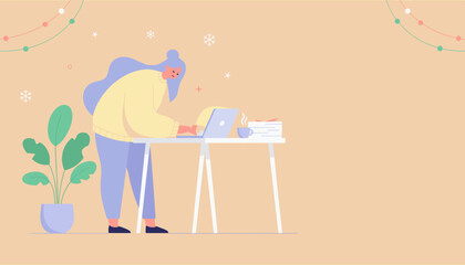 Stressed remote worker busy on laptop during the festive winter season dealing with deadlines