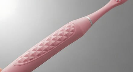 Pink Electric Toothbrush Detail: Modern Oral Hygiene and Dental Care Close-Up for Healthy Smiles and Gums