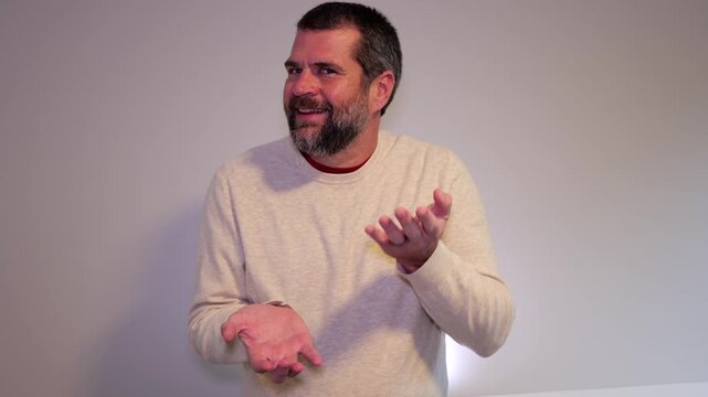 Six-Seven 6-7 67 Meme Trend - Middle Aged Dad Demonstrating Gestures Involved with Latest Craze Among Kids, Tweens, Teens, and Social Media