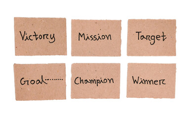 Handwritten Victory, mission, target, goal, champion and winner Concepts on Brown Cardboard Labels