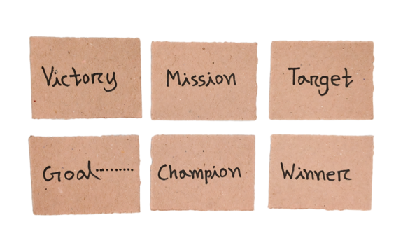Handwritten Victory, mission, target, goal, champion and winner Concepts on Brown Cardboard Labels
