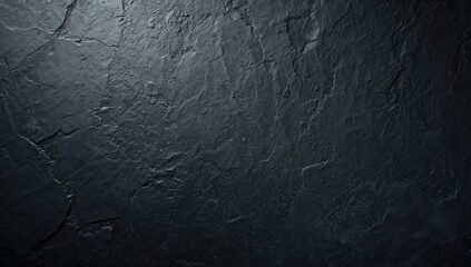 Obraz premium Black stone texture background, ideal for editorial header layout