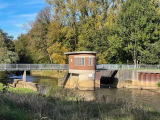 river and bridge with blue sky in landscape