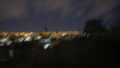 Defocused abstract background featuring urban lights, suitable for UI backdrop