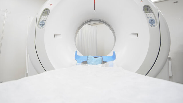 CT scanner in a modern medical facility, showcasing advanced technology and precision imaging for x-ray diagnosis and tomography procedures with copy space