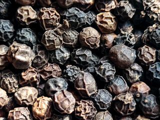 Macro Shot of Black Peppercorns