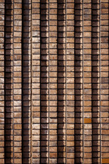 Background of old brown lined brick wall texture, abstract architecture wallpaper.