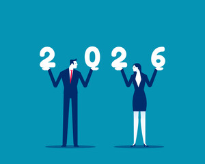 2026. Businessman and businesswoman holding figures of 2026