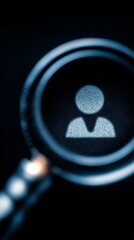 Career Focus: Magnifying glass hovers over a human icon, symbolizing the core of talent search, recruitment and career growth.