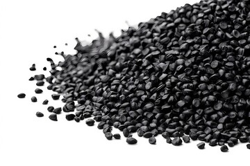 Black cumin seeds piled in a mound on a white background for culinary and health uses