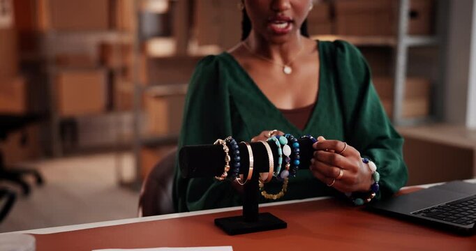 Entrepreneur, video and hands with jewelry, small business and promotion with laptop for live stream. Digital marketing, products and person with handmade bracelets, talking and sales on social media - Powered by Adobe