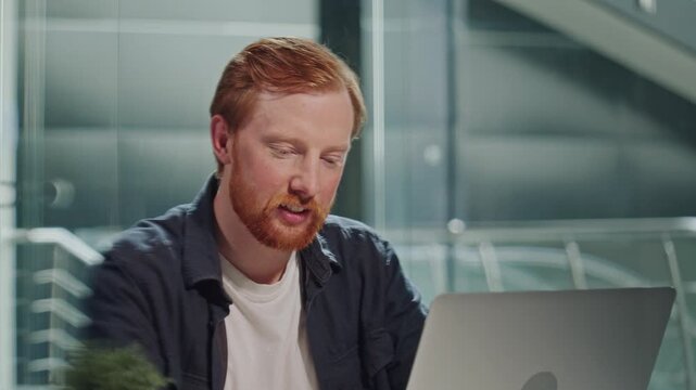 Mental Wellness, Good Mood, Leadership. A Professional Man Works in a Bright Office and Bursts Into Laughter, Showing Emotional Balance, Confidence, and a Healthy Approach to Successful Daily Work