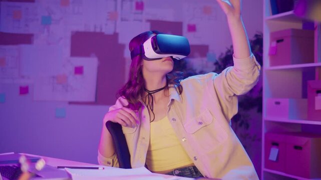 Mixed Reality, Immersive Tech, Gen Z Future. Girl Sits in Neon-Lit Room Wearing VR or AR Glasses, Interacting with Digital Space. Personal Moment in a Visually Intense Virtual World