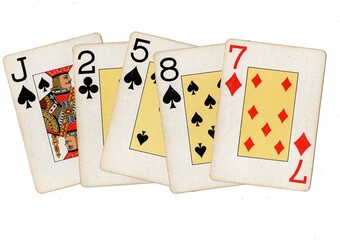 A hand of vintage playing cards isolated on a white background.