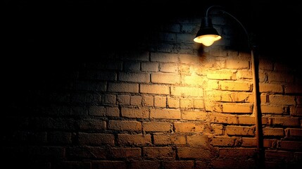 Street lamp illuminating a brick wall in the dark of night, close up