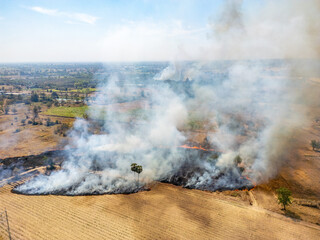 Aerial view from drone showing open burning in farmland