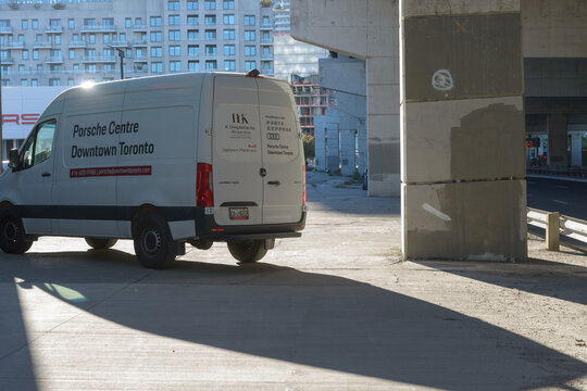 Porsche Centre Downtown Toronto van parked at 259 Lake Shore Blvd E