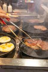 cooking steak spaghetti at vertical composition