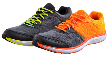Pair of athletic running shoes with bright orange and neon yellow laces on black background