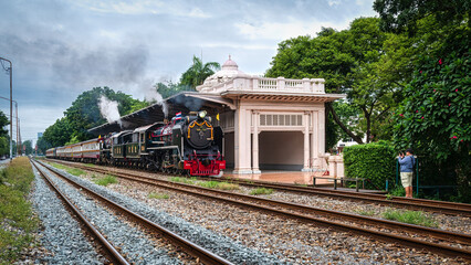 Pacific steam locomotives no. 824 and 850 passing through Suan Chitlada railway station Bangkok