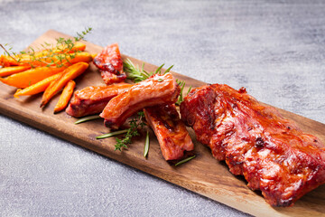 Roasted rack of pork ribs and sweet potato fries