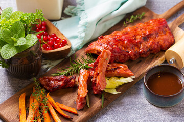 Roasted rack of pork ribs and sweet potato fries