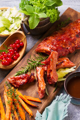 Roasted rack of pork ribs and sweet potato fries
