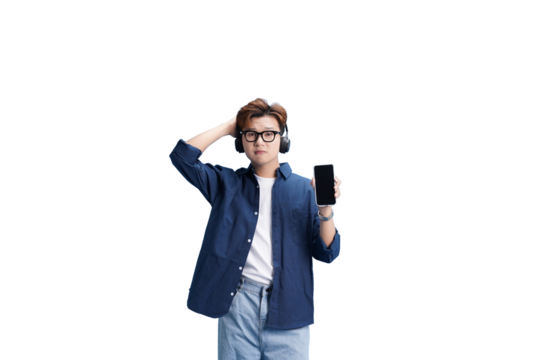 Modern Musings: A contemplative figure, clad in a casual outfit, holds a smartphone aloft. The subject appears engrossed in audio via headphones.