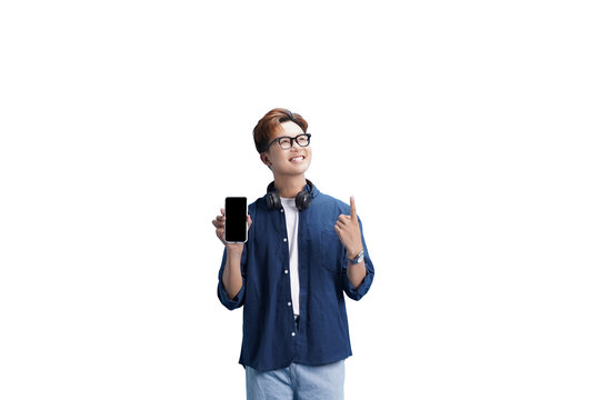 Tech Savvy Youngster: A tech-savvy individual, radiating joy, holds up a smartphone with an empty screen, inviting a connection to new possibilities, perfect for showcasing your digital content. 