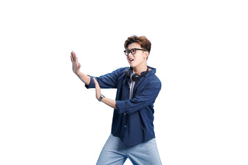 Energetic young man with headphones: A dynamic young man with glasses strikes a pose with outstretched arms. The man exudes a vibrant energy, his headphones adding a touch of modern flair.
