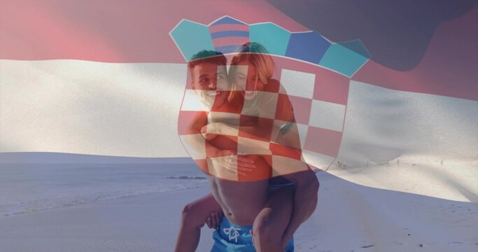 Giving piggyback ride couple wearing swim trunks, bikini on sandy beach, with Croatian flag overlay