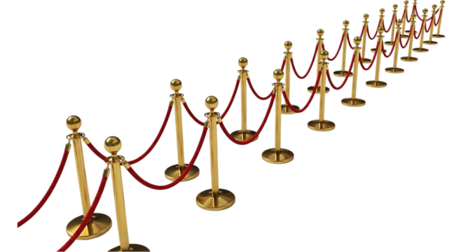An elegant pathway created by gold stanchions and red velvet rope barriers for an exclusive premiere