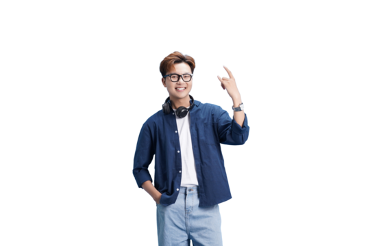 Cheerful Youthful with Headphones: a young man is standing with his finger up smiling and wearing headphones. capturing the image of the young man's cool fashion and modern music style.