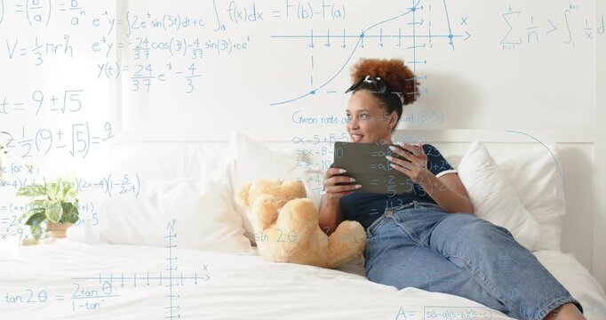 Woman tapping tablet showing math education formulas friend opening duffel revealing teddy smiling