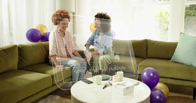 Woman wiping tear receiving hug, clapping as hologram cost estimation graph pulsing crowning friend