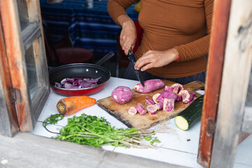 Woman preparing traditional meal in Ecuador