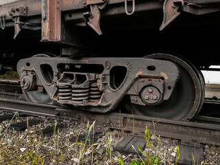 An accident on the railroad. Derailment of railway wagons. As a result of the train accident, the train derailed. A railway carriage that derailed on a sunny day. A derailed carriage. 
