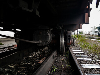 A derailed carriage. As a result of the train accident, the train derailed. An accident on the railroad. A railway carriage that derailed on a sunny day. Derailment of railway wagons.