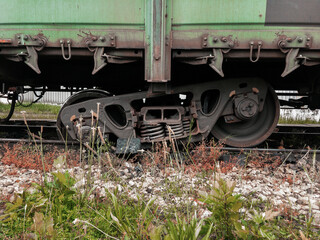 An accident on the railroad. A derailed carriage. A railway carriage that derailed on a sunny day. Derailment of railway wagons. As a result of the train accident, the train derailed.