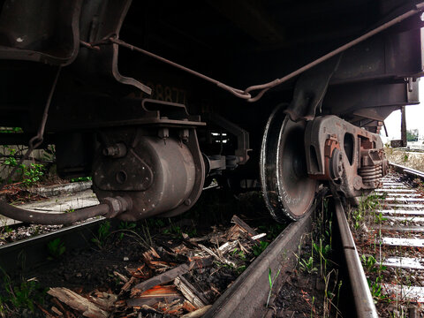 A derailed carriage. An accident on the railroad. As a result of the train accident, the train derailed. A railway carriage that derailed on a sunny day. Derailment of railway wagons.