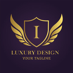 Obraz premium Elegant golden shield with wings and letter i, symbolizing luxury, prestige, and exclusive design for branding and corporate identity