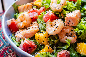 Fresh seafood salad with vibrant citrus fruits