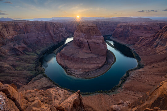 Colorado Horseshoe Bend at sunrise with sunburst effect