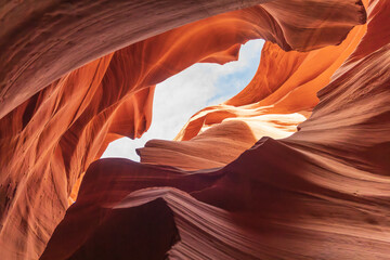 Antelope Canyon sandstone formations under a clear sky