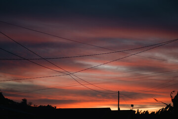 Dramatic Sky at Sunset with Power Lines
